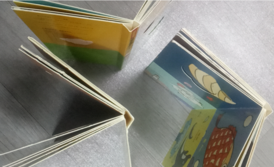 Book casing in machine